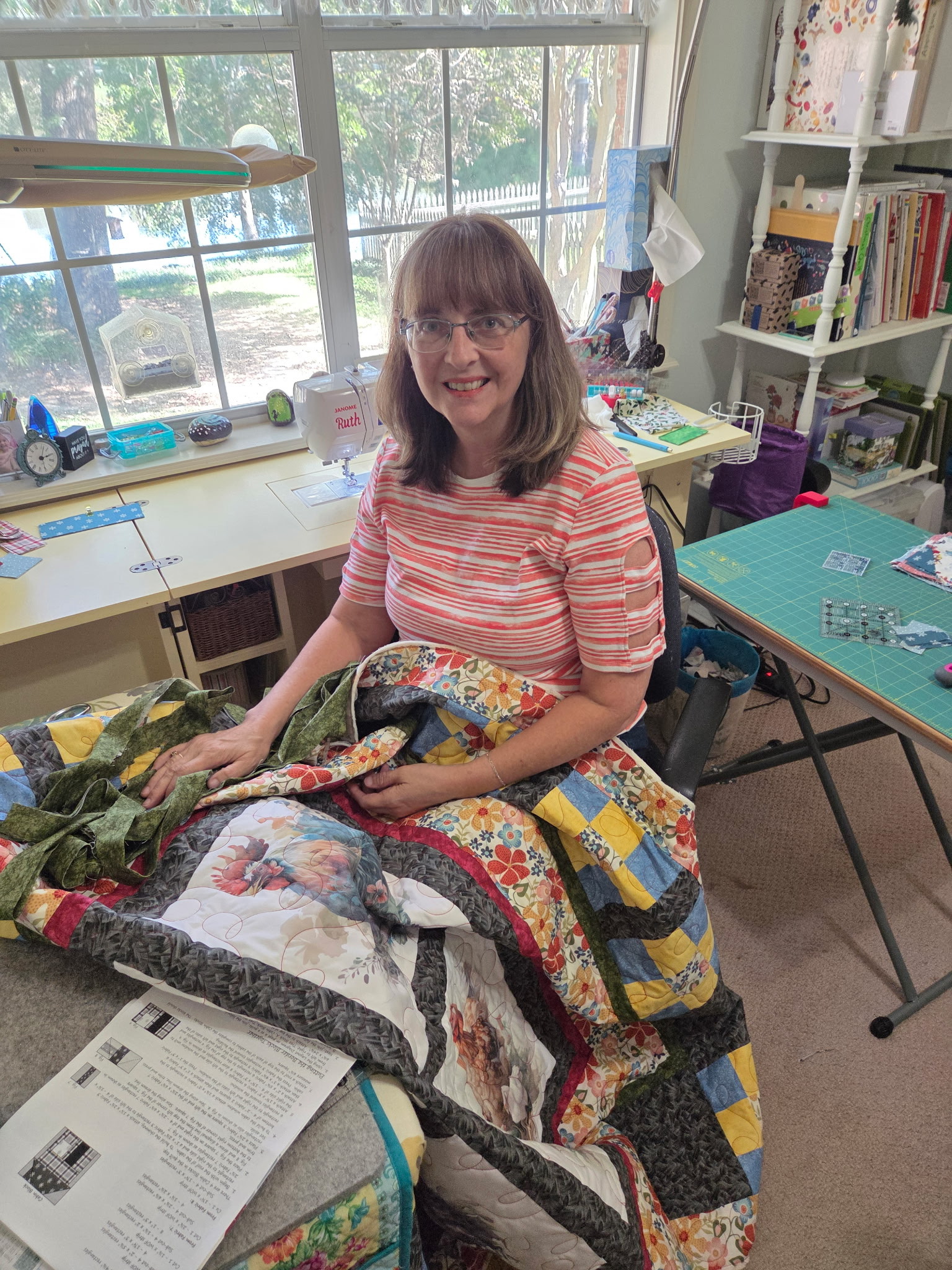 Neena quilting at her sewing table